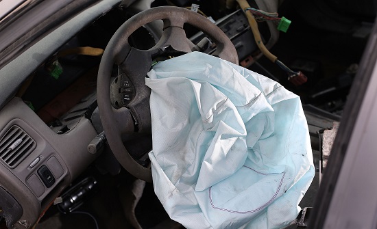 MEDLEY, FL - MAY 22: A deployed airbag is seen in a 2001 Honda Accord at the LKQ Pick Your Part salvage yard on May 22, 2015 in Medley, Florida. The largest automotive recall in history centers around the defective Takata Corp. air bags that are found in millions of vehicles that are manufactured by BMW, Chrysler, Daimler Trucks, Ford, General Motors, Honda, Mazda, Mitsubishi, Nissan, Subaru and Toyota. (Photo by Joe Raedle/Getty Images)