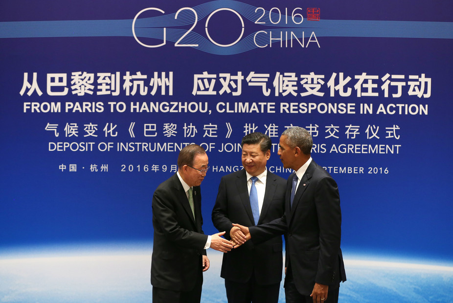 Chinese President Xi Jinping, center, U.S. President Barack Obama and U.N. Secretary-General Ban Ki-moon shake hands during a joint ratification of the Paris climate change agreement in eastern China’s Zhejiang province, Sept. 3, 2016. How Hwee Young/Pool Photo via AP