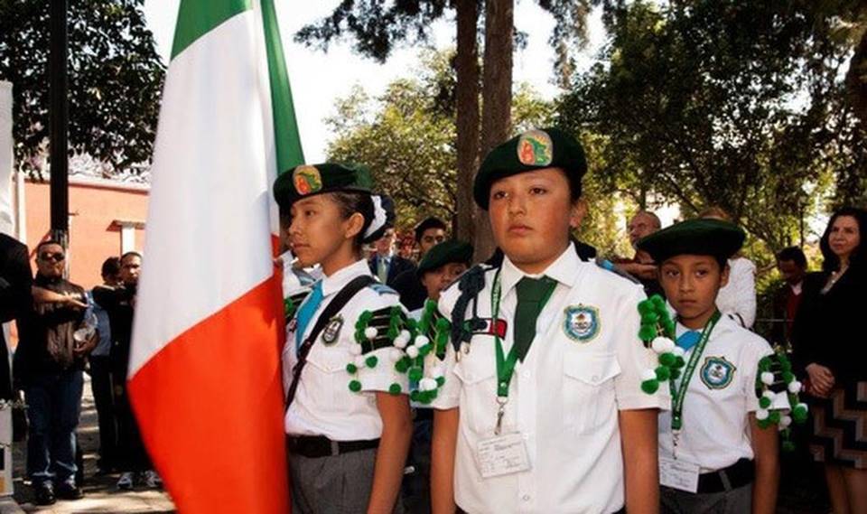 Schoolchildren in Mexico carry Irish flags at the annual observance for St. Patrick’s Battalion. Ireland Department of Foreign Affairs and Trade (Photo: star-telegram)