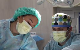 surgeons performing surgery